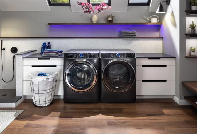 front view of a luxury ge profile washer and dryer in a modern laundry room