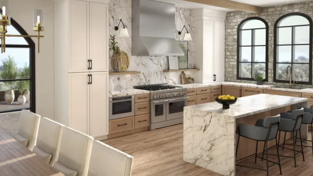 view of a transitional kitchen with a beige panel ready side by side refrigerator