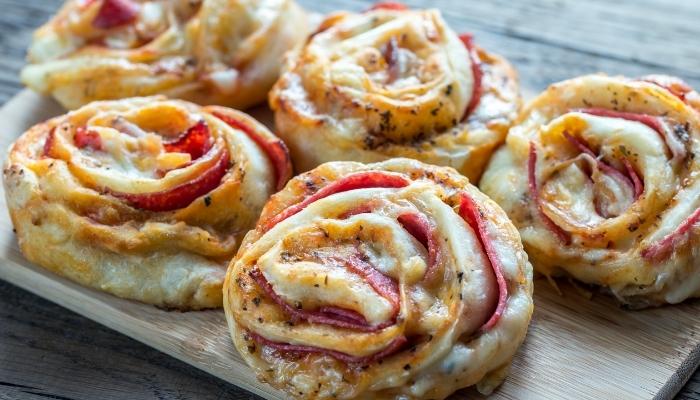 Pepperoni pizza rolls on a platter