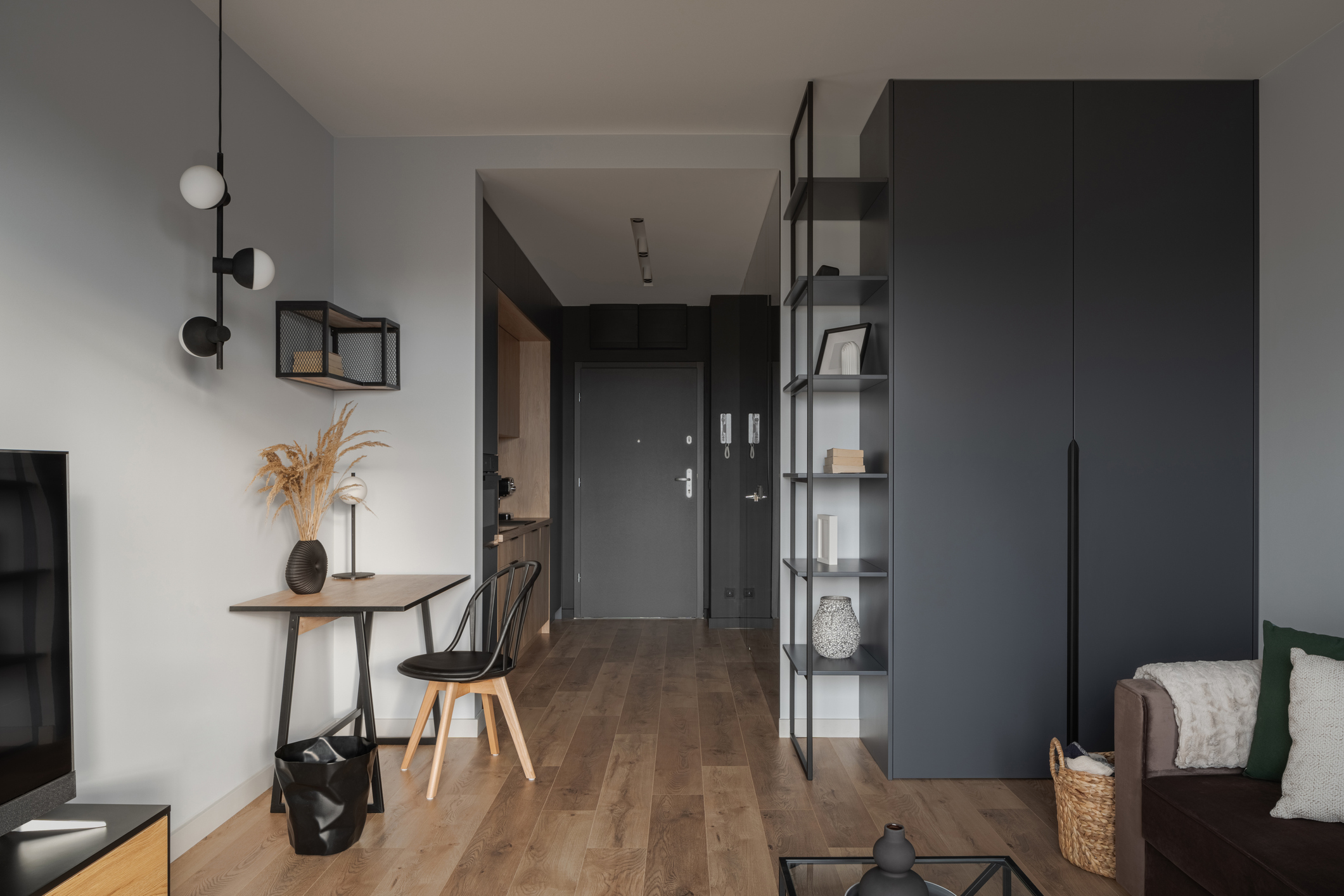 stylish small apartment with dark colors 