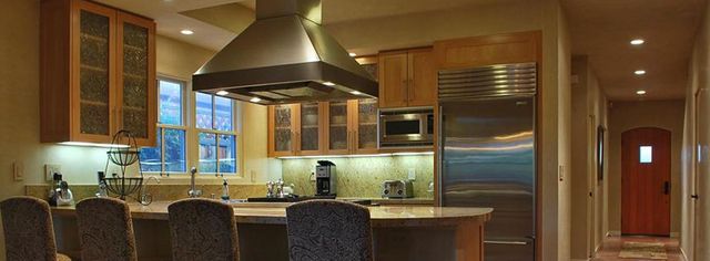 island range hood over l-shaped counter