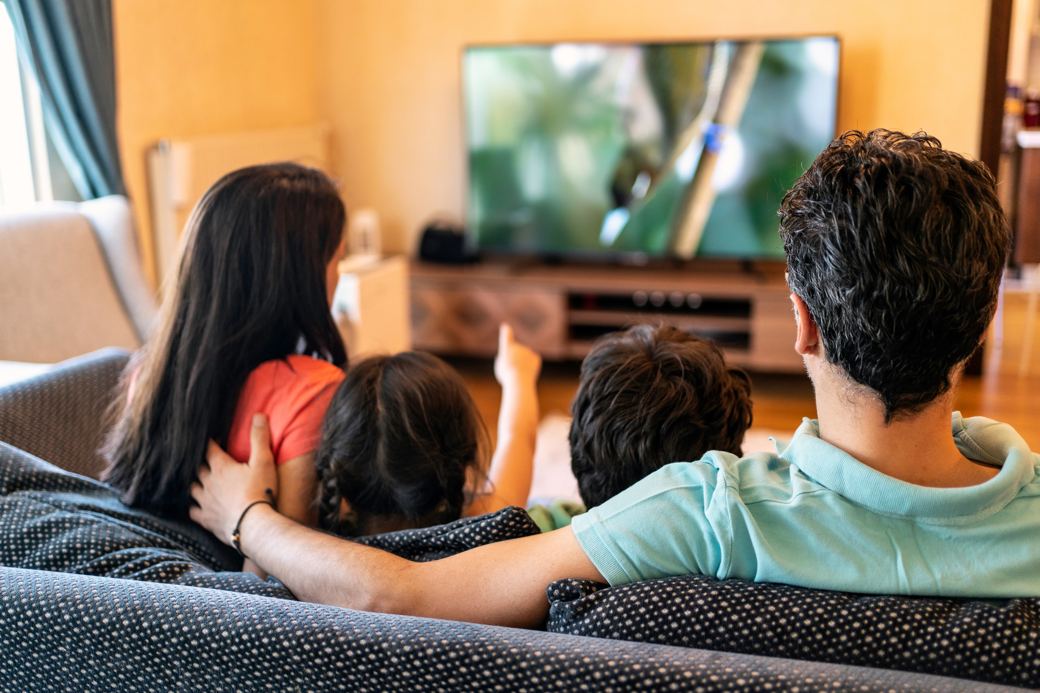 Family watching TV