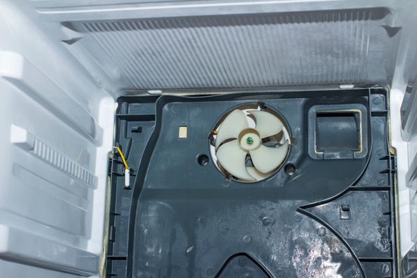 A close-up of a refrigerator fan 