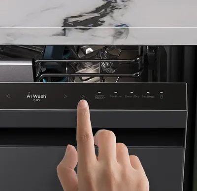 A person selecting a wash option using the Samsung Bespoke DW90F89T0UMT dishwasher panel 