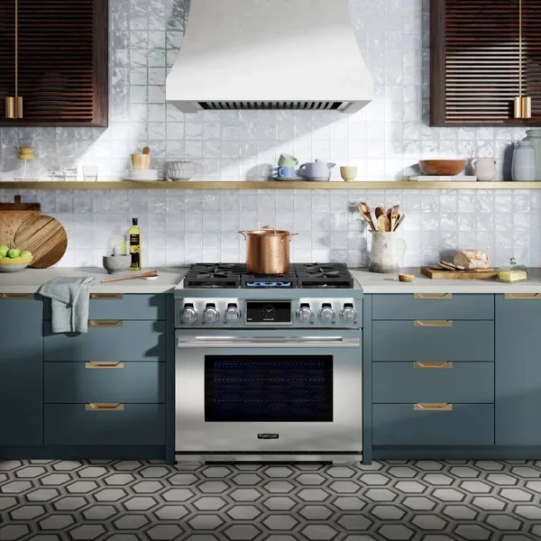 The Signature Kitchen Suite SKSGR360S range in an upscale kitchen 