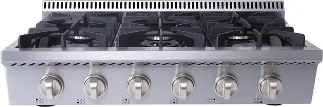gas rangetop with grates and silver knobs