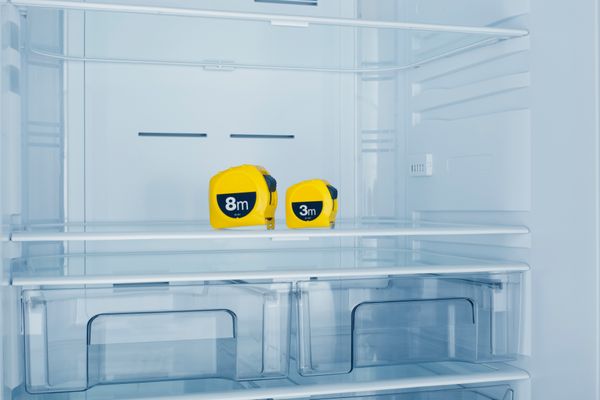 iStock Credit: servet yigit A tape measure inside of a refrigerator