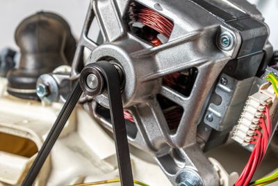 A close-up of a washer motor 