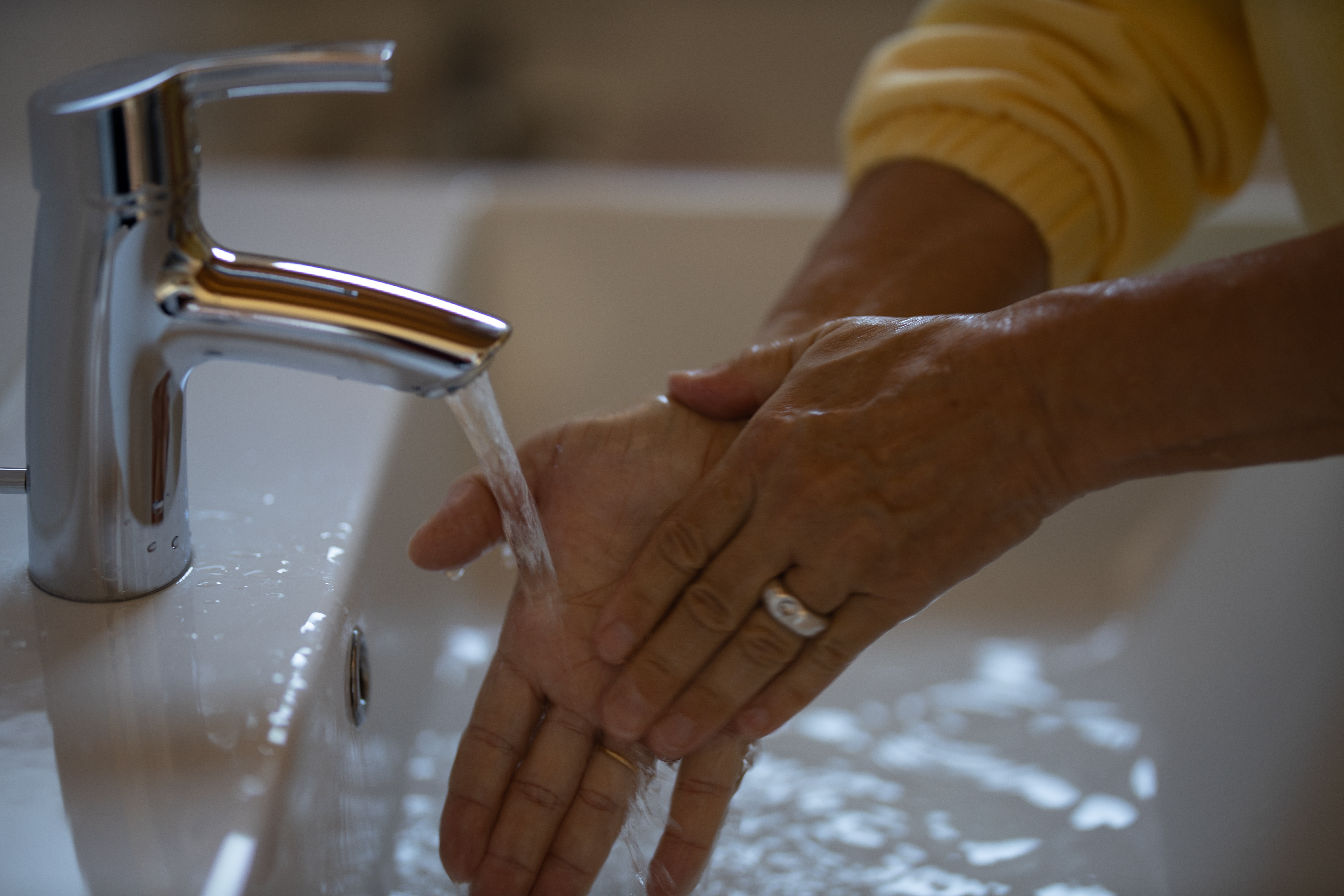 Washing Hands in a Sink