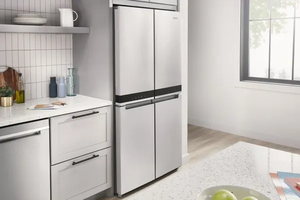 The Whirlpool WRQA59CNKZ refrigerator in a kitchen 
