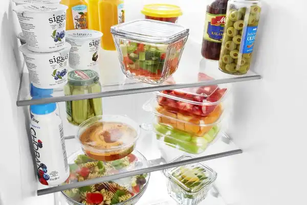 Credit: Whirlpool Various food items inside the Whirlpool WRS325SDHZ side by side refrigerator
