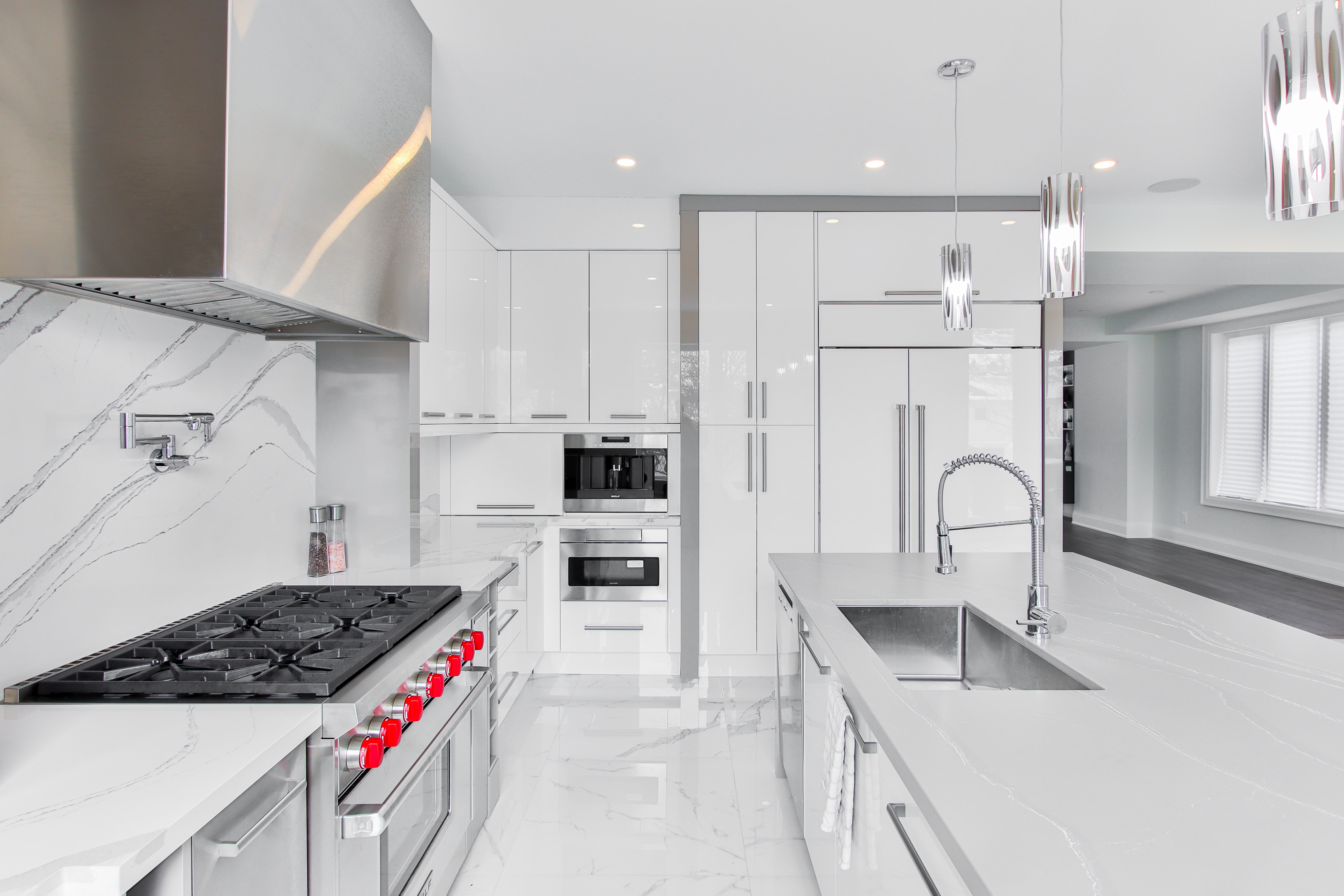 White and Black Kitchen with High End Appliances