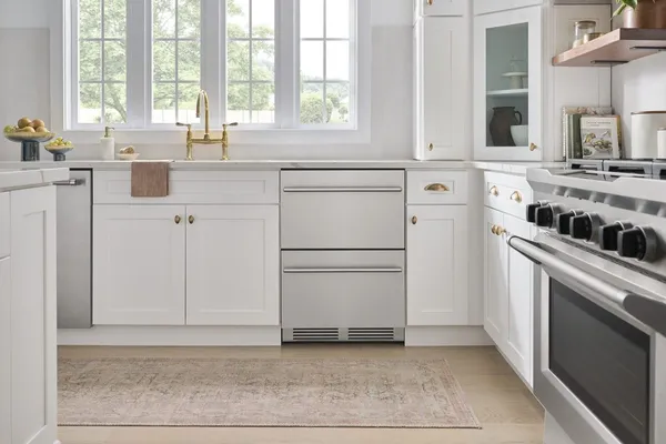 The Zephyr Prsrv PRRD24C1AS drawer refrigerators in a kitchen 