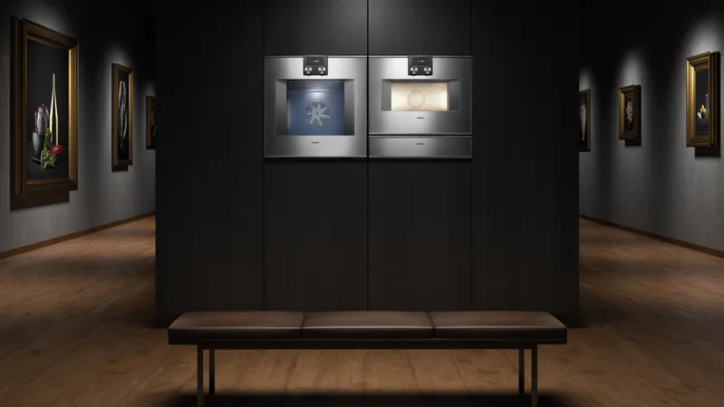  A wide shot of side-by-side Gaggenau wall ovens in a luxury kitchen 