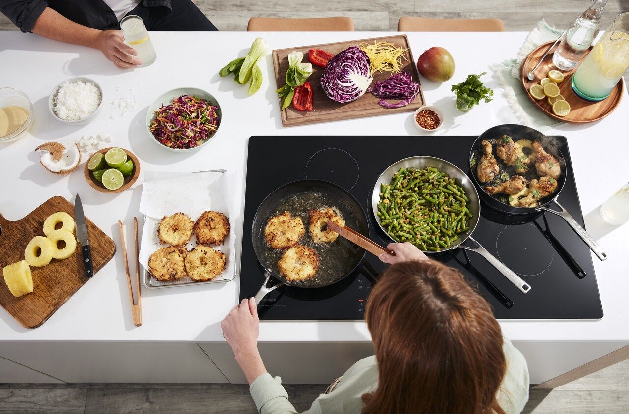 An overhead shot of an induction cooktop in use