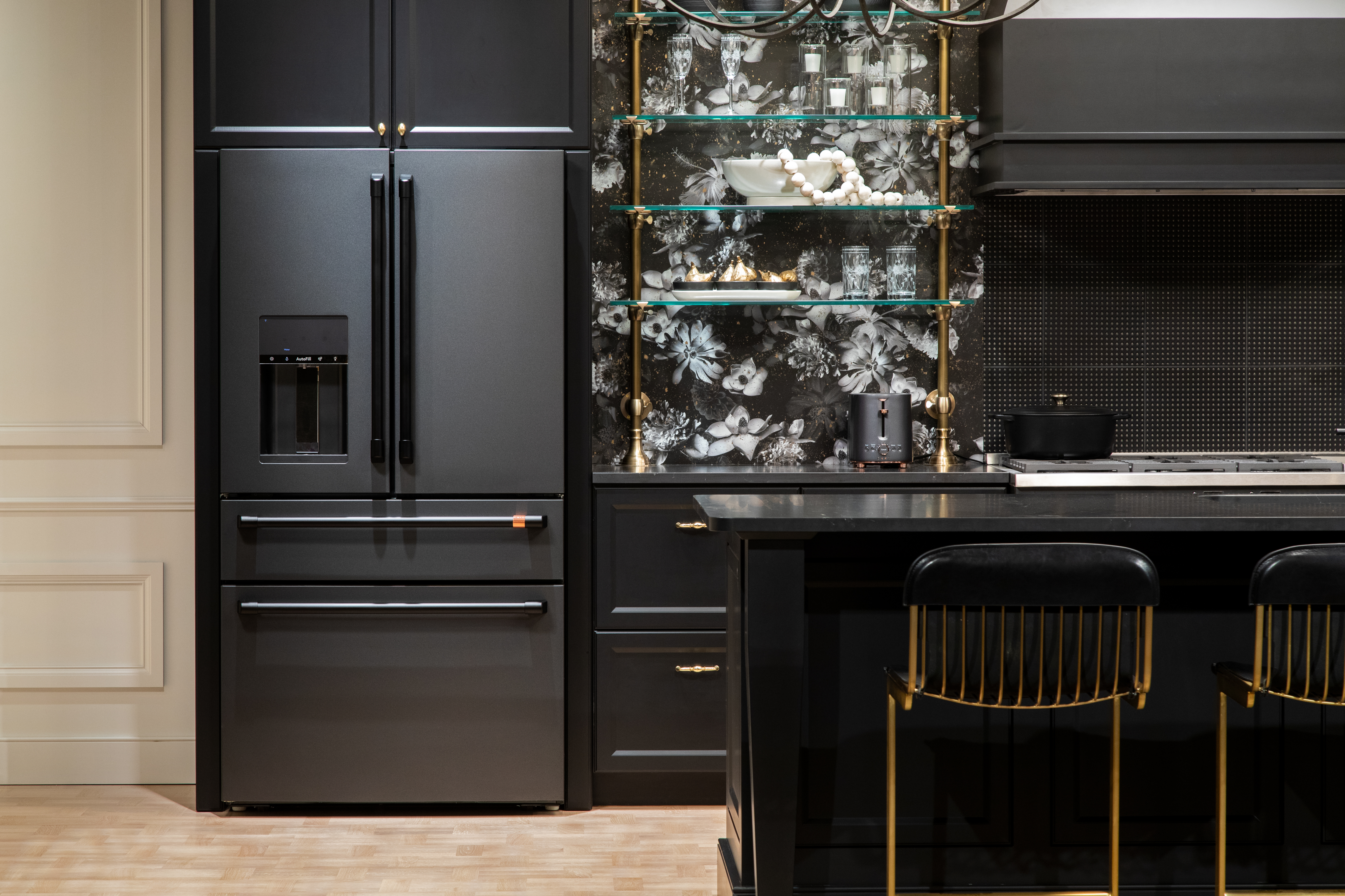 A black Café French door refrigerator in a kitchen 