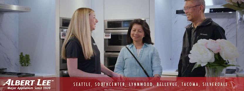 An Albert Lee sales associate helps customers 