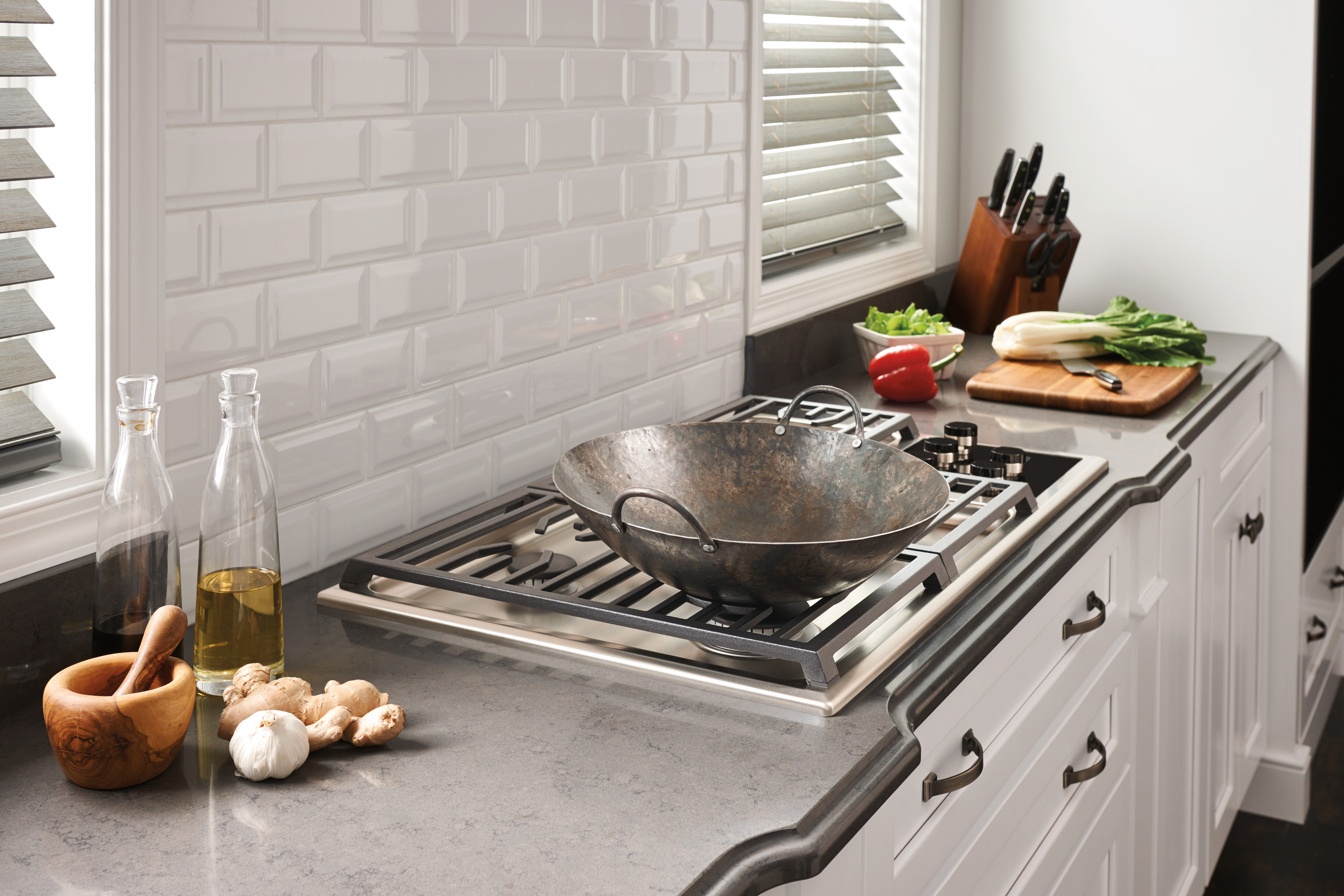  A wok grate on a Wolf gas cooktop 