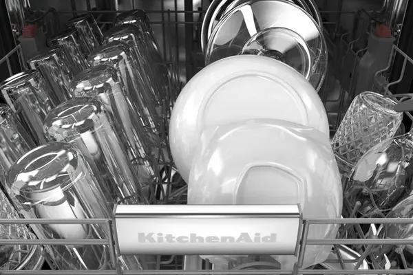 Dishes inside a KitchenAid dishwasher