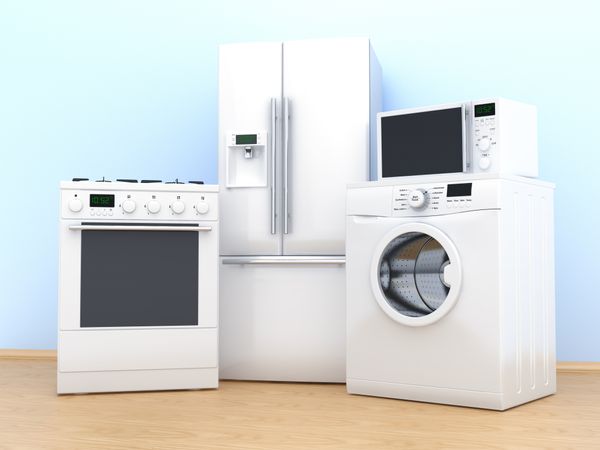 A variety of kitchen appliances against a light blue background 