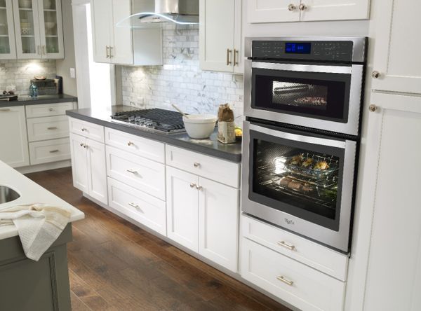 A Whirlpool combination wall oven in a kitchen 