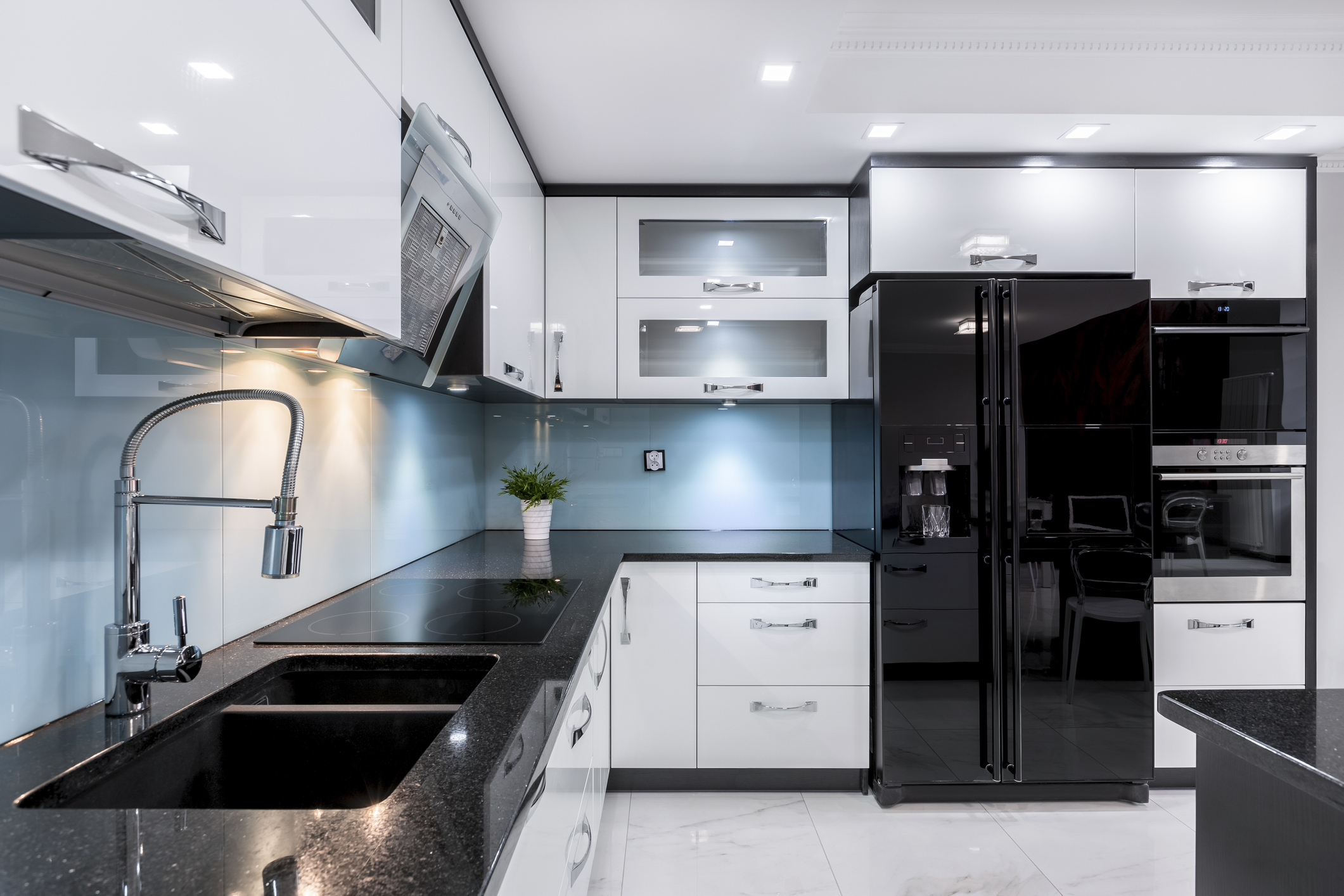 sleek kitchen with black appliances