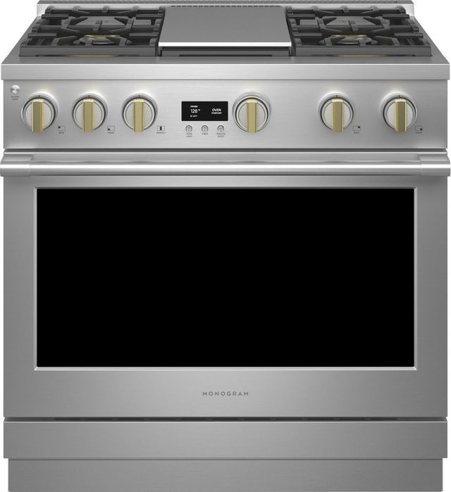 Stock photo of a stainless steel Monogram brand gas range. 