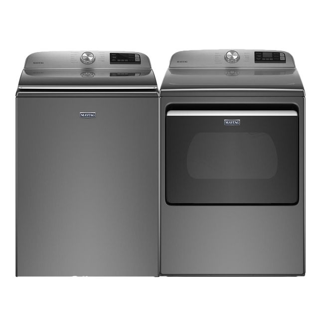 Stock photo of a titanium Maytag brand laundry pair with a top load washer and front load dryer.