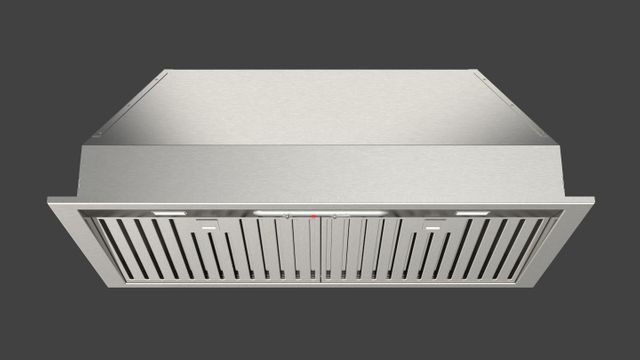 Stock photo of a stainless steel Fulgor Milano brand range hood. 