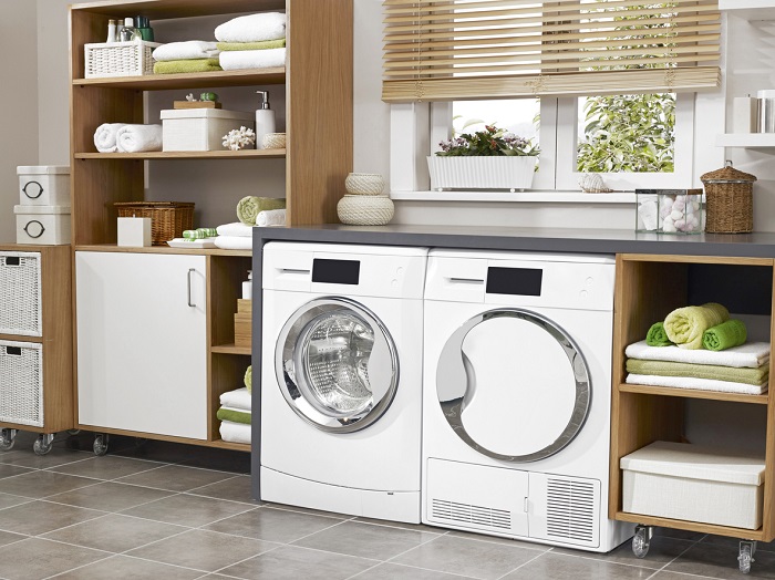 Modern laundry room with washer dryer set.