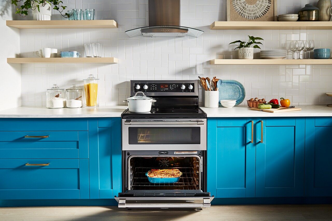 A Maytag double oven range shown with its bottom oven open 