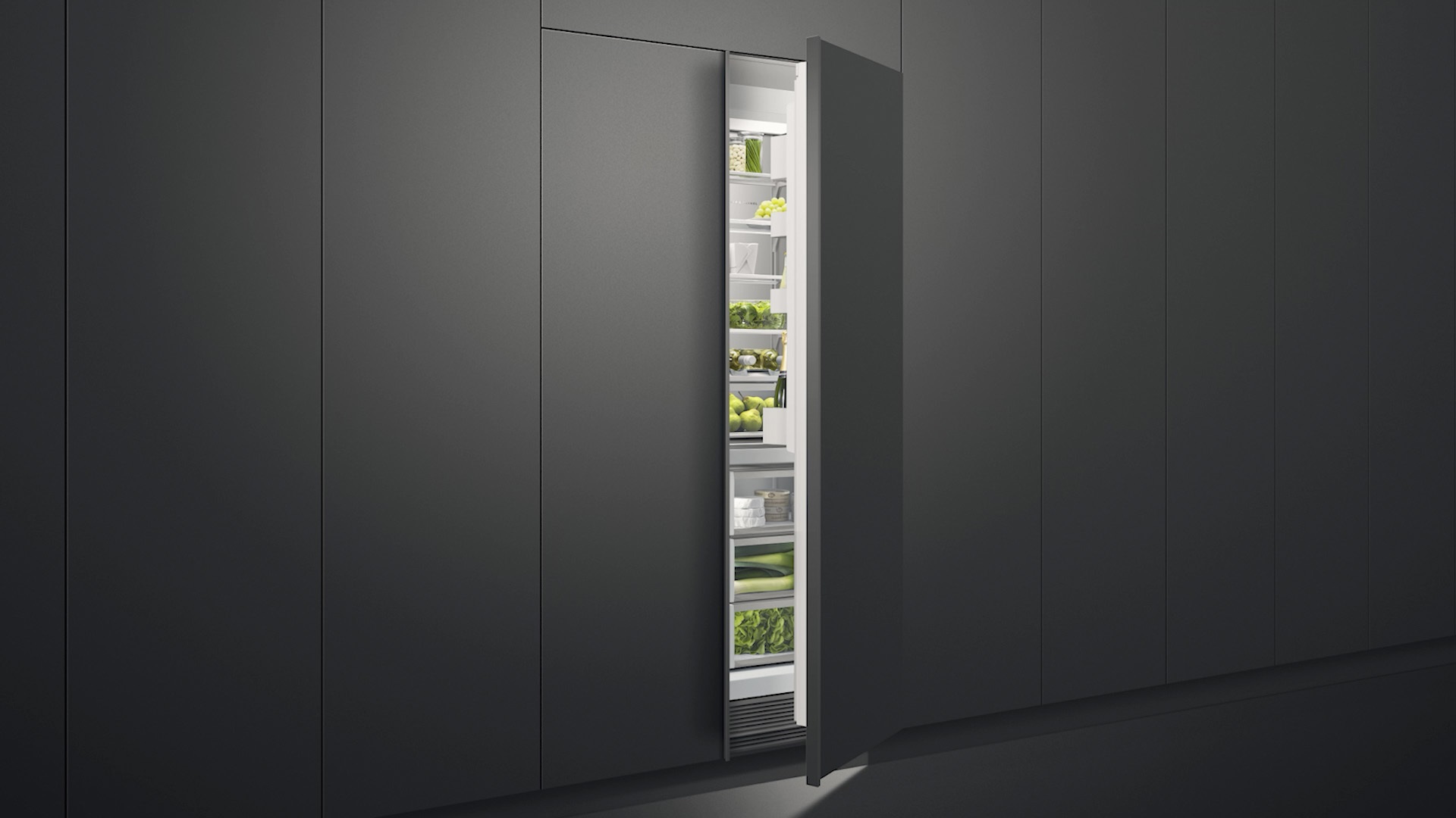 Panel ready Fisher Paykel refrigerator in black wall