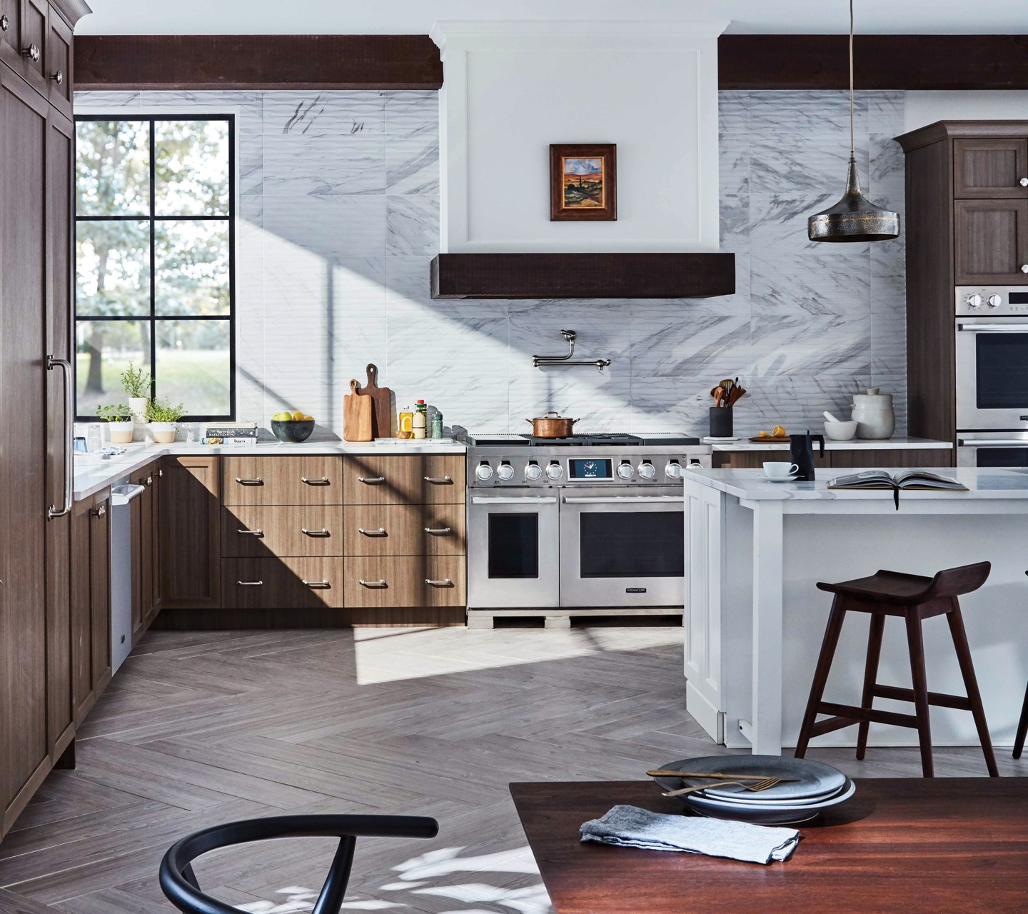 A kitchen featuring several high-end appliances 