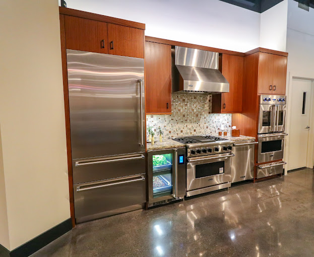 Stainless steel appliances are featured in Bekins Grand Rapids showroom
