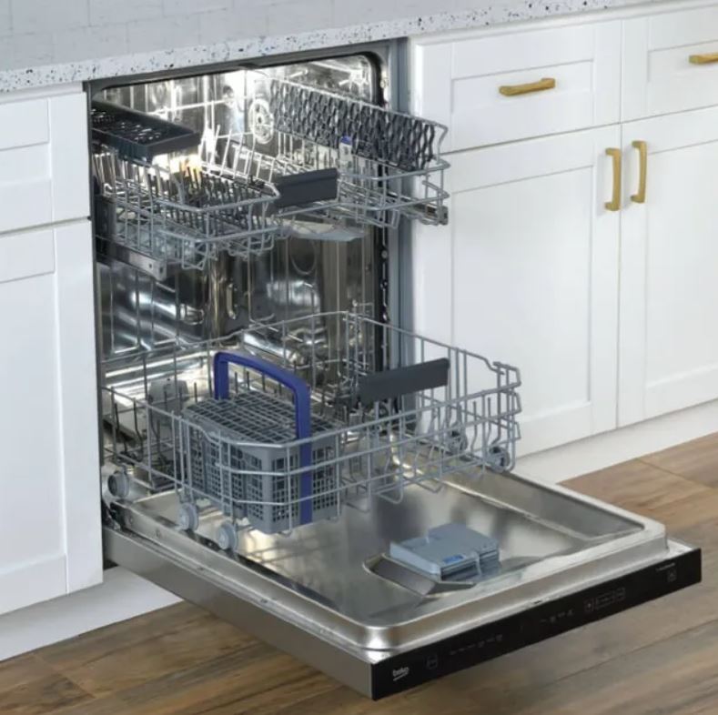 An open Beko dishwasher installed in a white cabinet