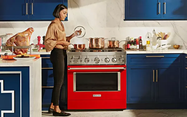 Woman using her kitchenaid range