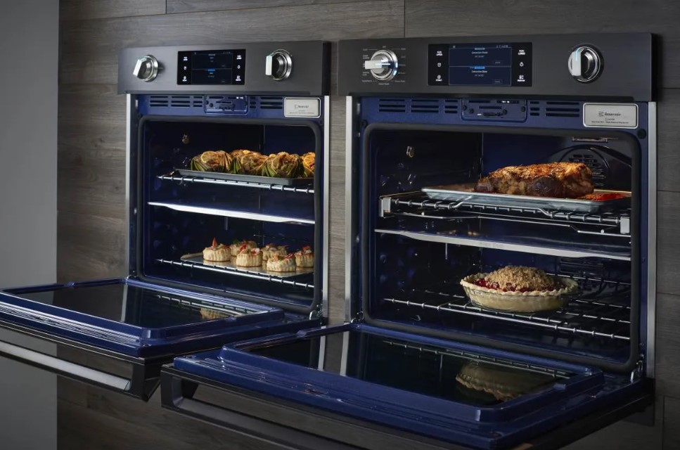 Two Samsung wall ovens are installed side by side in a wall