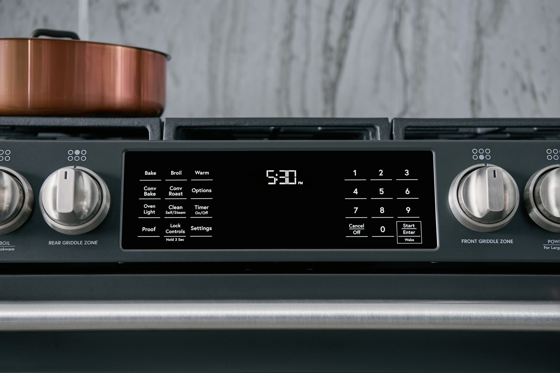 closeup of front controls on Café freestanding gas range