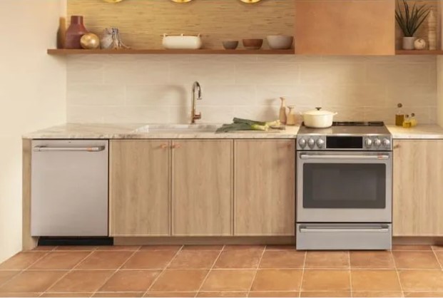 A light brown modern kitchen with a Cafe range and Cafe dishwasher