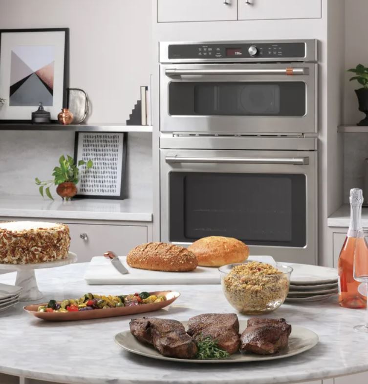 double wall oven with lots of food on the counter