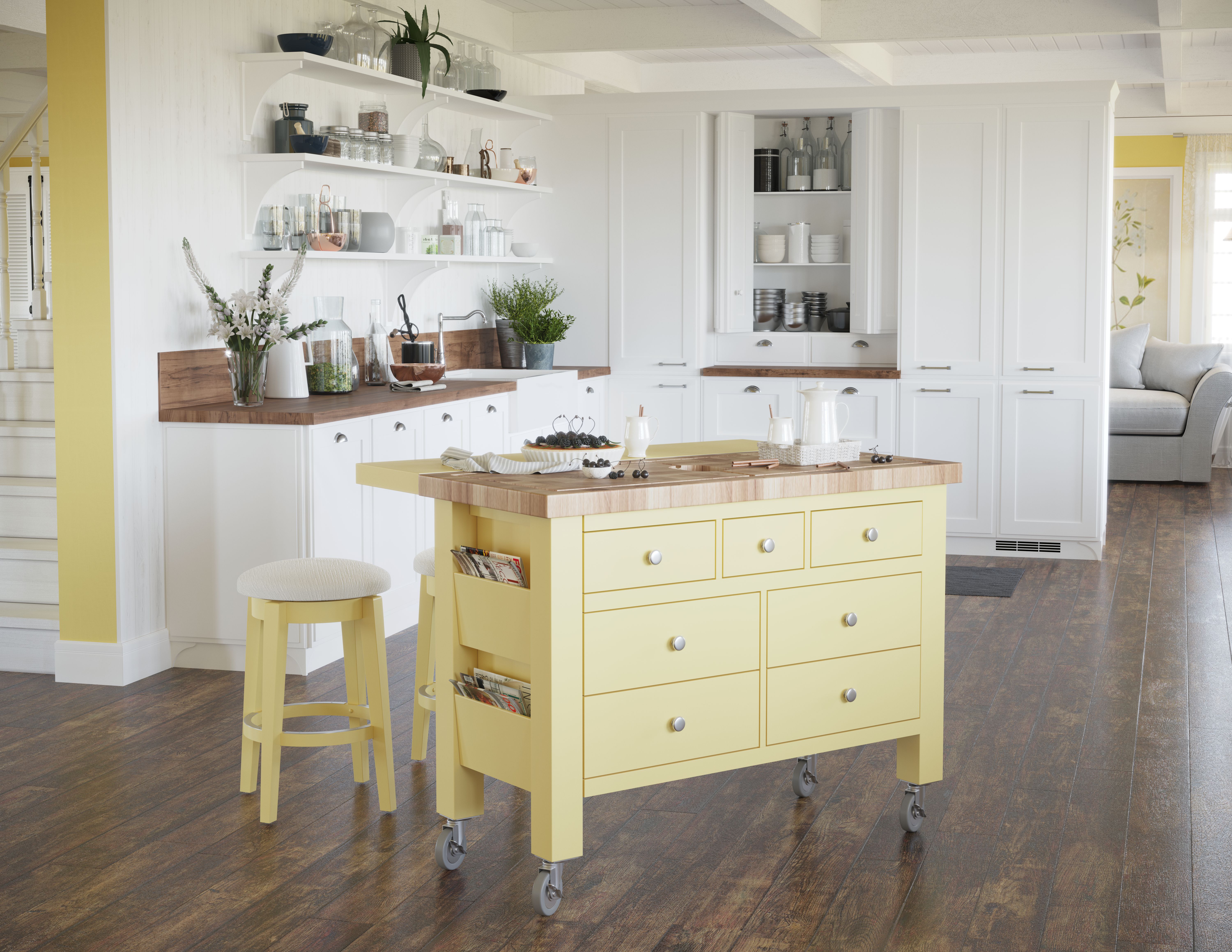 Wide shot of yellow kitchen island with matching bar stool
