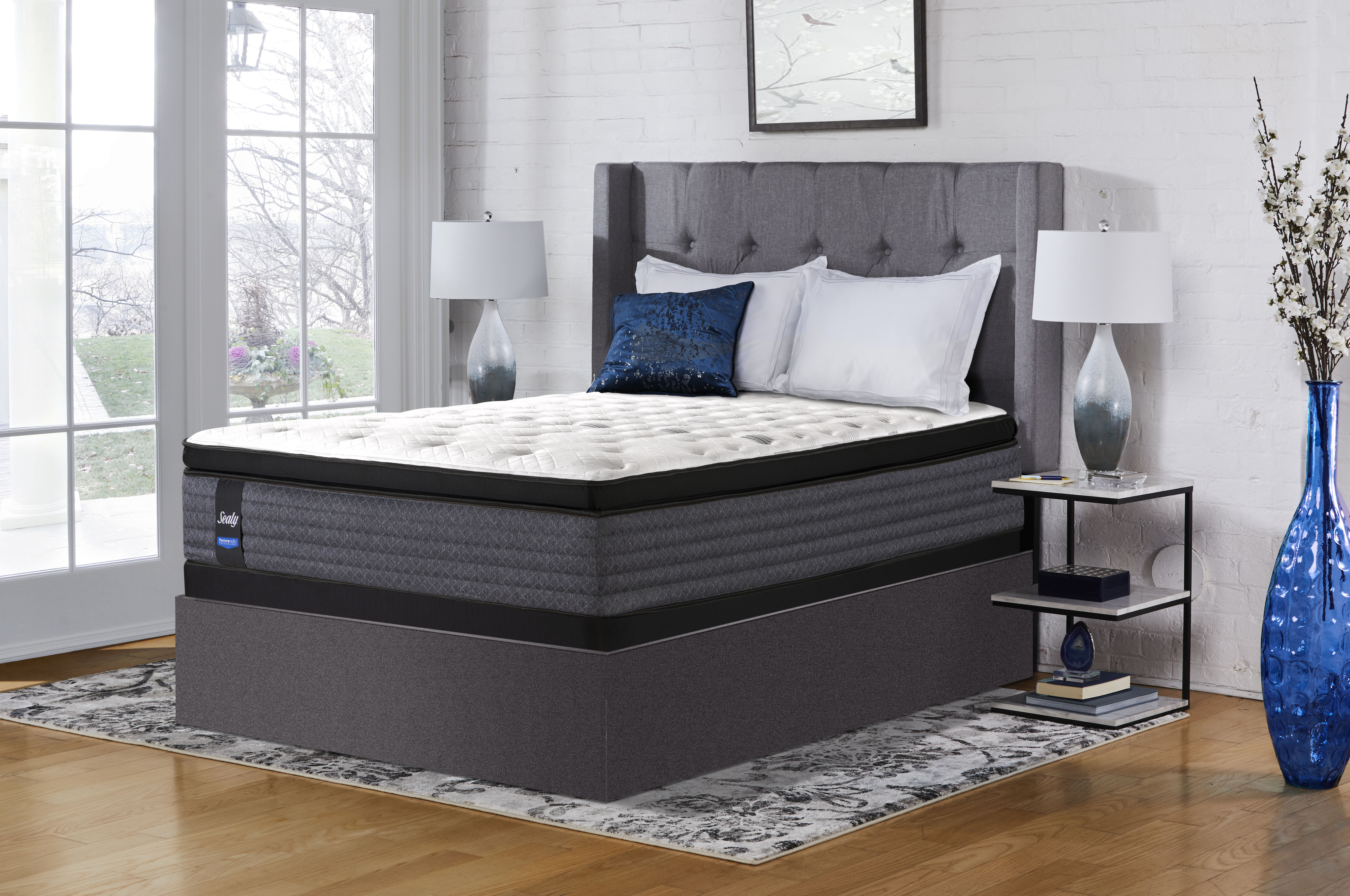 Sealy mattresses in a wingback bed frame 