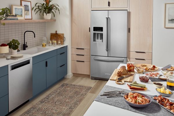 A KitchenAid French door counter depth refrigerator in a kitchen 