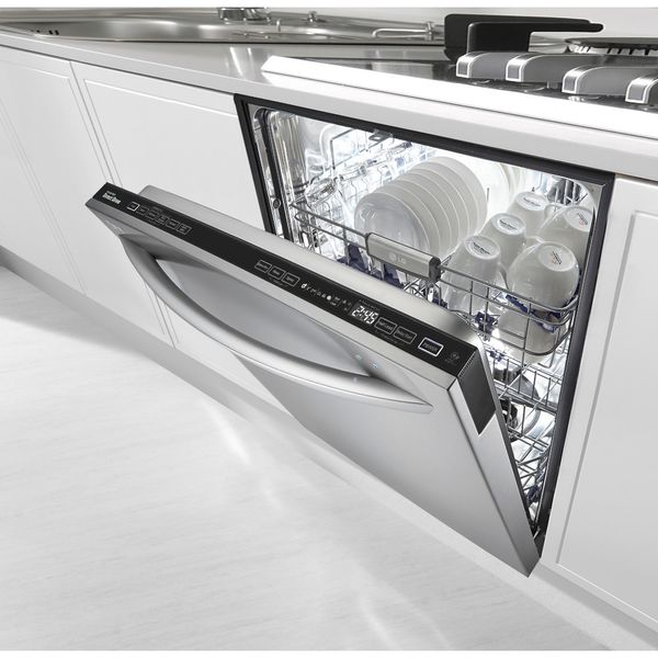 An LG dishwasher shown with its door ajar 