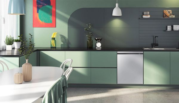 A green-themed kitchen featuring a Samsung dishwasher 