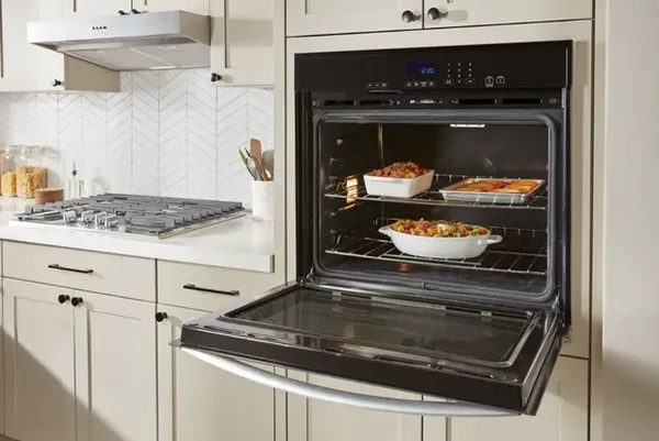 The Whirlpool WOES3030LS wall oven featuring a variety of baked goods 