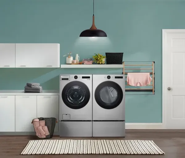 The LG WM5500HVA washer and DLEX5500V dryer set in a modern laundry room 