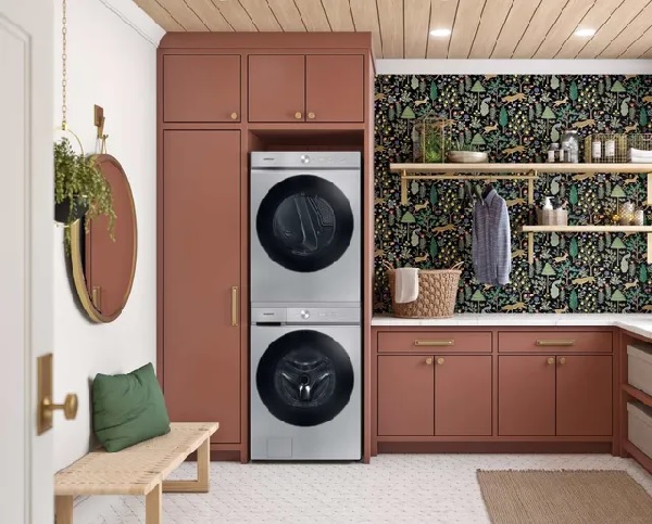 The Samsung 8700 series washer and dryer stacked in a laundry room 