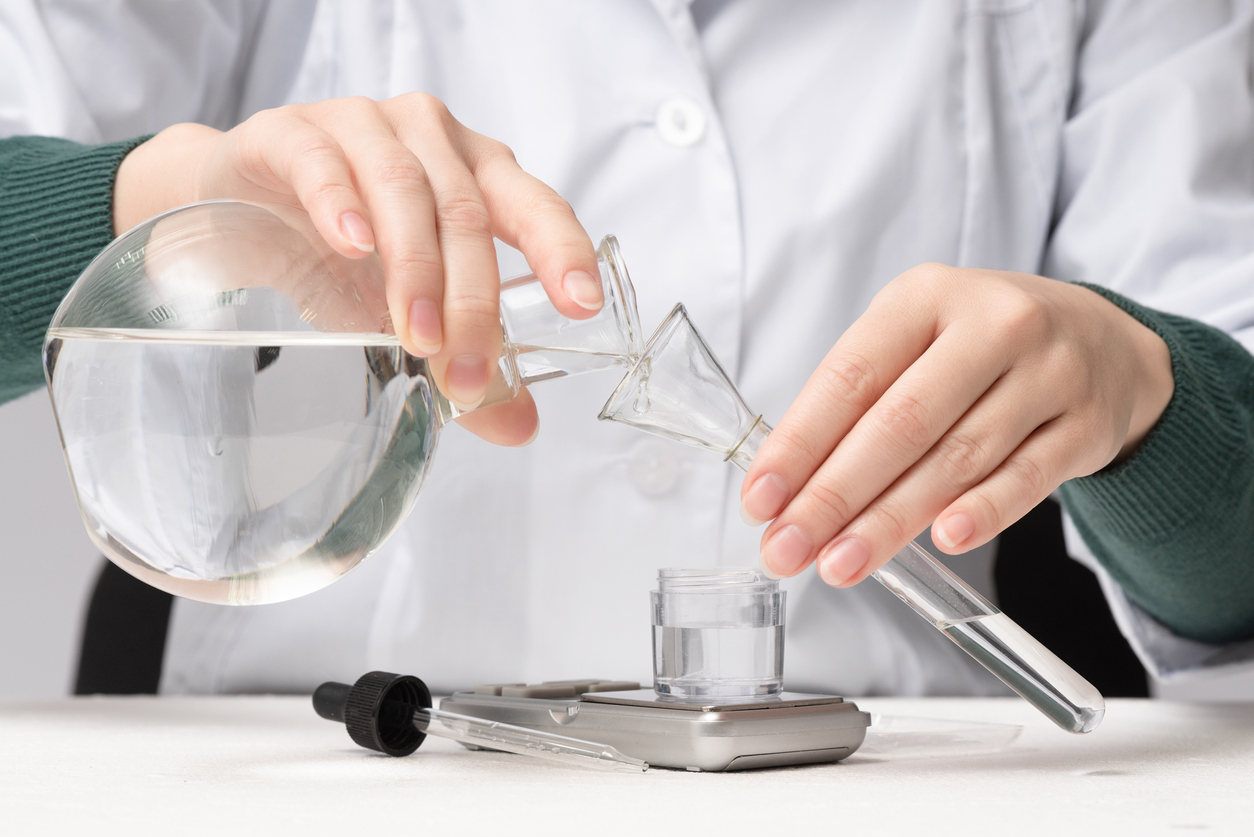 scientist is analyzing and testing contaminated water