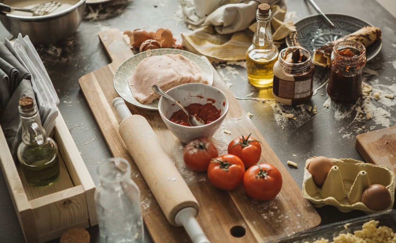 a very messy kitchen table that’s been cooked at 